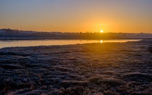 Preview wallpaper river, coast, sunset, sun, landscape