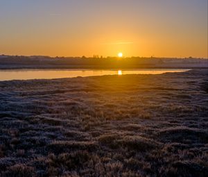 Preview wallpaper river, coast, sunset, sun, landscape