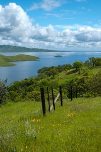 Preview wallpaper river, fence, grass, slope, landscape