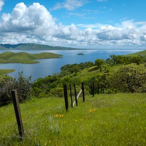 Preview wallpaper river, fence, grass, slope, landscape