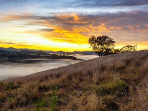 Preview wallpaper river, fog, coast, sunset, clouds