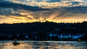 Preview wallpaper river, forest, buildings, sunset, rays, dark