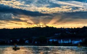 Preview wallpaper river, forest, buildings, sunset, rays, dark