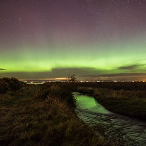 Preview wallpaper river, grass, field, northern lights, lights