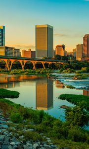 Preview wallpaper river, greens, bridge, buildings, city, sunset