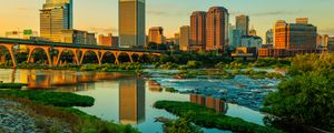 Preview wallpaper river, greens, bridge, buildings, city, sunset