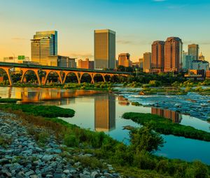 Preview wallpaper river, greens, bridge, buildings, city, sunset