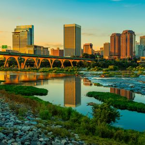 Preview wallpaper river, greens, bridge, buildings, city, sunset