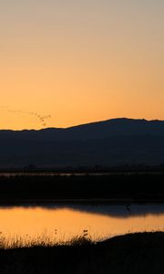 Preview wallpaper river, hills, silhouettes, evening