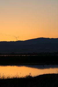 Preview wallpaper river, hills, silhouettes, evening