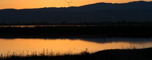 Preview wallpaper river, hills, silhouettes, evening