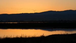 Preview wallpaper river, hills, silhouettes, evening