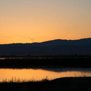 Preview wallpaper river, hills, silhouettes, evening