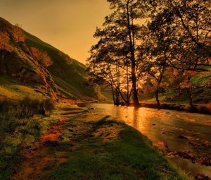 Preview wallpaper river, lighting, trees, evening, beams, shadows, mountains, reflection
