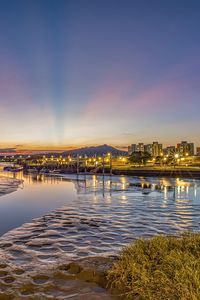 Preview wallpaper river, lights, shore, hills, evening
