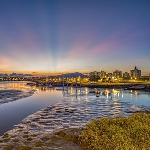 Preview wallpaper river, lights, shore, hills, evening