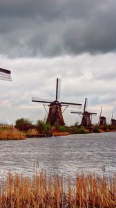 Preview wallpaper river, mill, wind, clouds