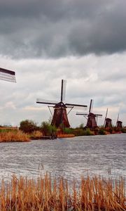 Preview wallpaper river, mill, wind, clouds