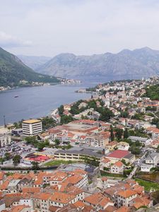 Preview wallpaper river, mountains, buildings, houses, city