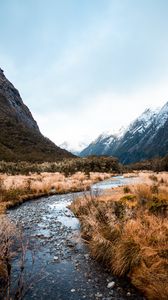 Preview wallpaper river, mountains, bushes, snow, snowy