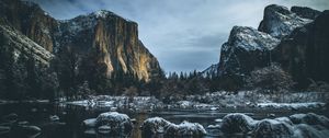 Preview wallpaper river, mountains, stones, shore, trees, cold, snowy