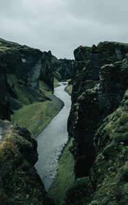 Preview wallpaper river, rocks, cliff, grass, winding