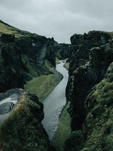 Preview wallpaper river, rocks, cliff, grass, winding