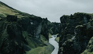 Preview wallpaper river, rocks, cliff, grass, winding