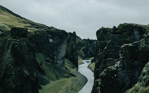 Preview wallpaper river, rocks, cliff, grass, winding