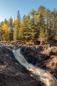 Preview wallpaper river, rocks, trees, autumn, sky