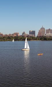 Preview wallpaper river, sail, boat, trees, buildings, city