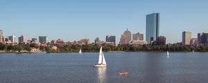 Preview wallpaper river, sail, boat, trees, buildings, city