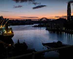 Preview wallpaper river, ship, bridge, city, sunset, dark