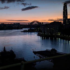 Preview wallpaper river, ship, bridge, city, sunset, dark