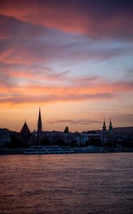 Preview wallpaper river, ship, towers, buildings, twilight, city