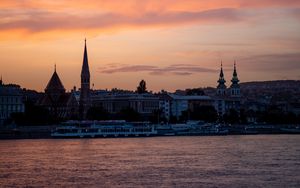 Preview wallpaper river, ship, towers, buildings, twilight, city