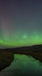 Preview wallpaper river, shore, grass, northern lights, night