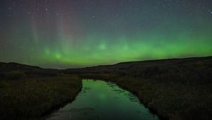 Preview wallpaper river, shore, grass, northern lights, night