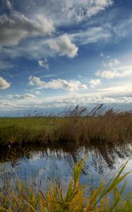 Preview wallpaper river, sky, clouds, air jordan