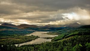 Preview wallpaper river, sky, gloomy, valley, cloudy