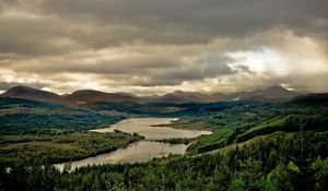 Preview wallpaper river, sky, gloomy, valley, cloudy