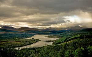 Preview wallpaper river, sky, gloomy, valley, cloudy