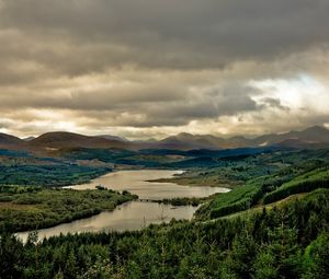 Preview wallpaper river, sky, gloomy, valley, cloudy