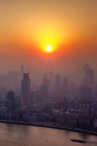 Preview wallpaper river, skyscrapers, dawn, fog, city