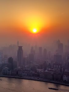 Preview wallpaper river, skyscrapers, dawn, fog, city