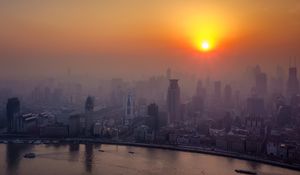 Preview wallpaper river, skyscrapers, dawn, fog, city