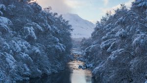 Preview wallpaper river, snow, current, mountain, trees, sky