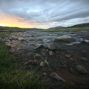 Preview wallpaper river, stones, clouds, sunset