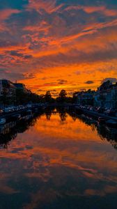 Preview wallpaper river, sunset, canal, city, netherlands