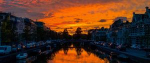 Preview wallpaper river, sunset, canal, city, netherlands